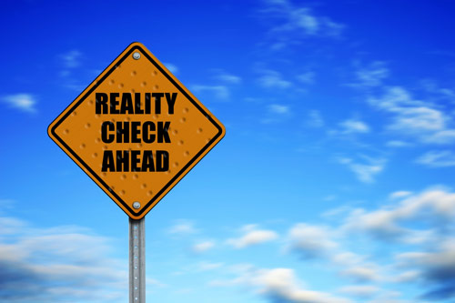 Image of sign reading Reality Check Ahead, http://mbofmadison.com/stoughton/reality-check/